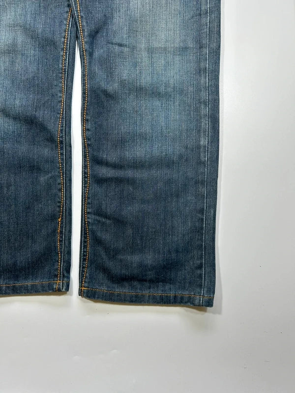Szerokie jeansy Y2K cyber baggy vintage haftowane kieszenie