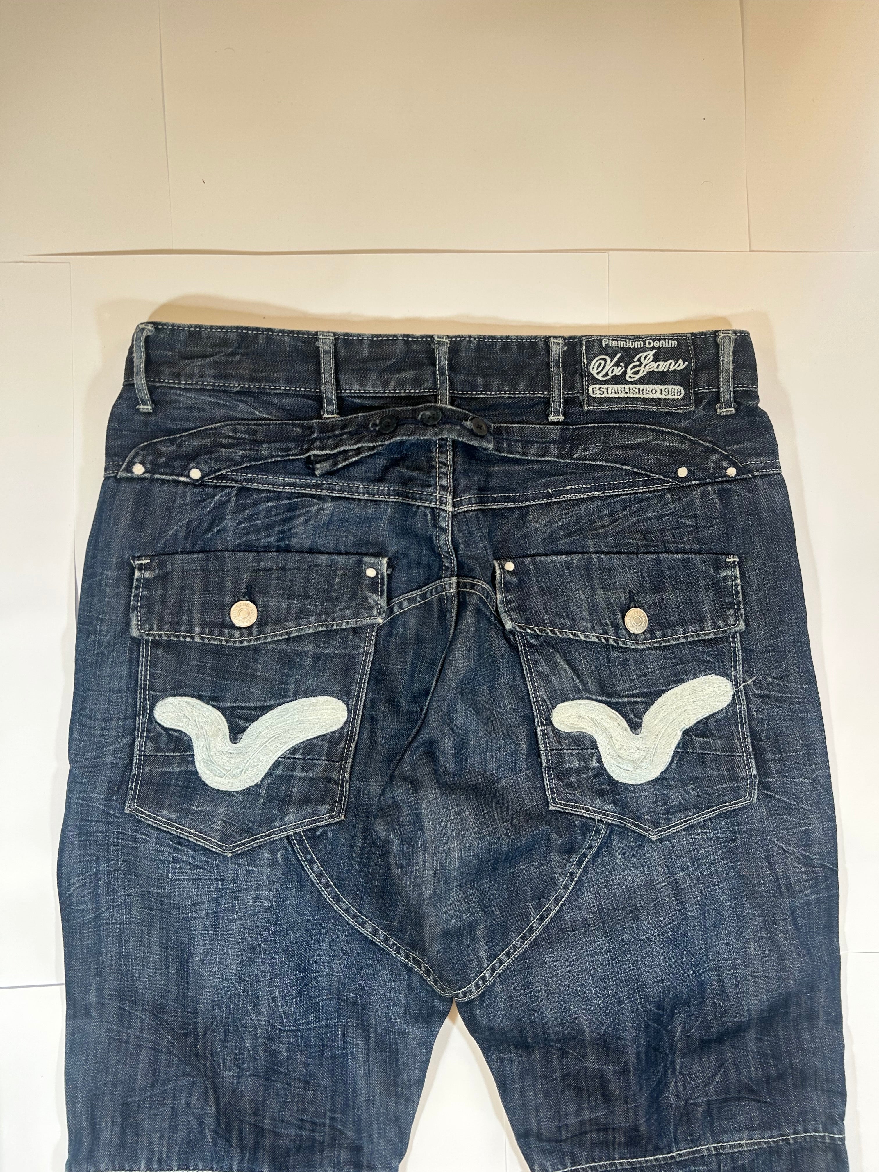 Baggy jeans denim z nadrukami na tylnych kieszeniach